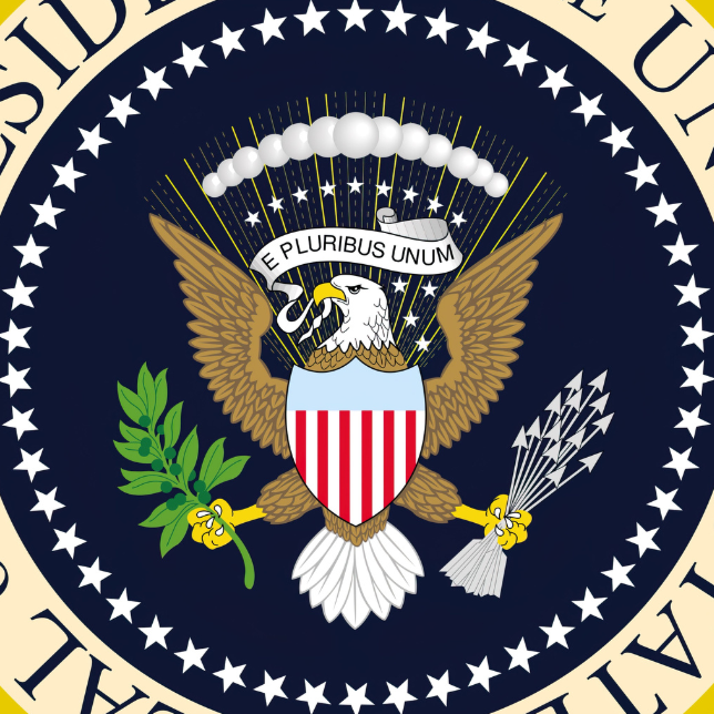 Okrągły dywan z motywem herbu Prezydenta USA